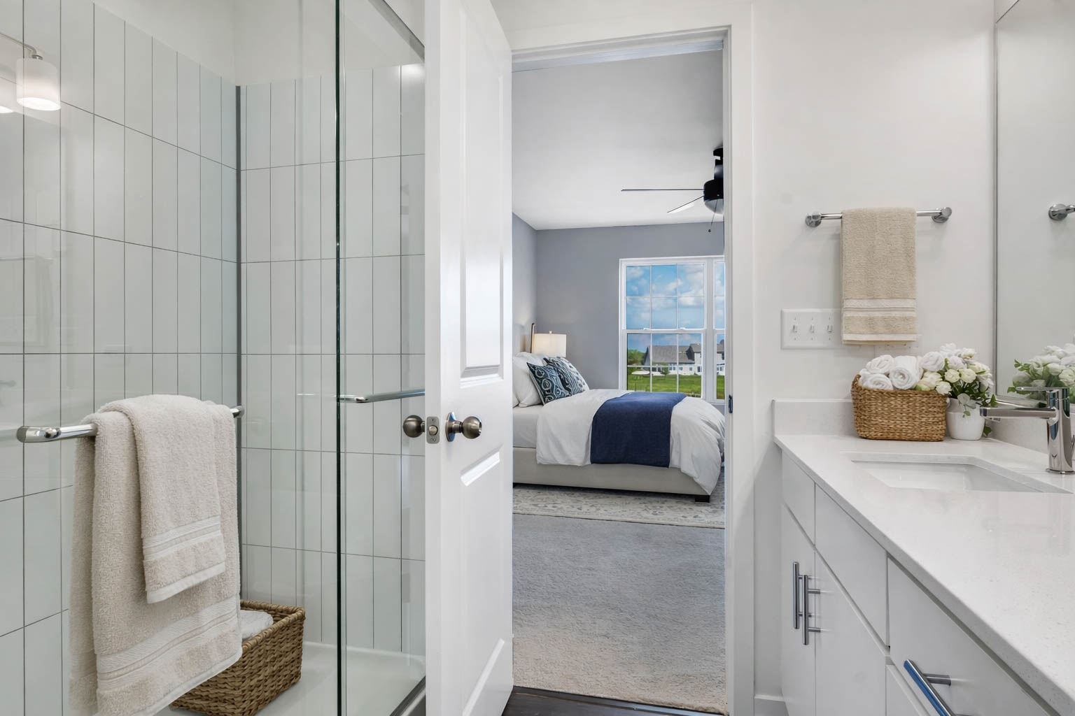 Bathroom with a glass-enclosed shower adjoining the bedroom at Home at Ashcroft