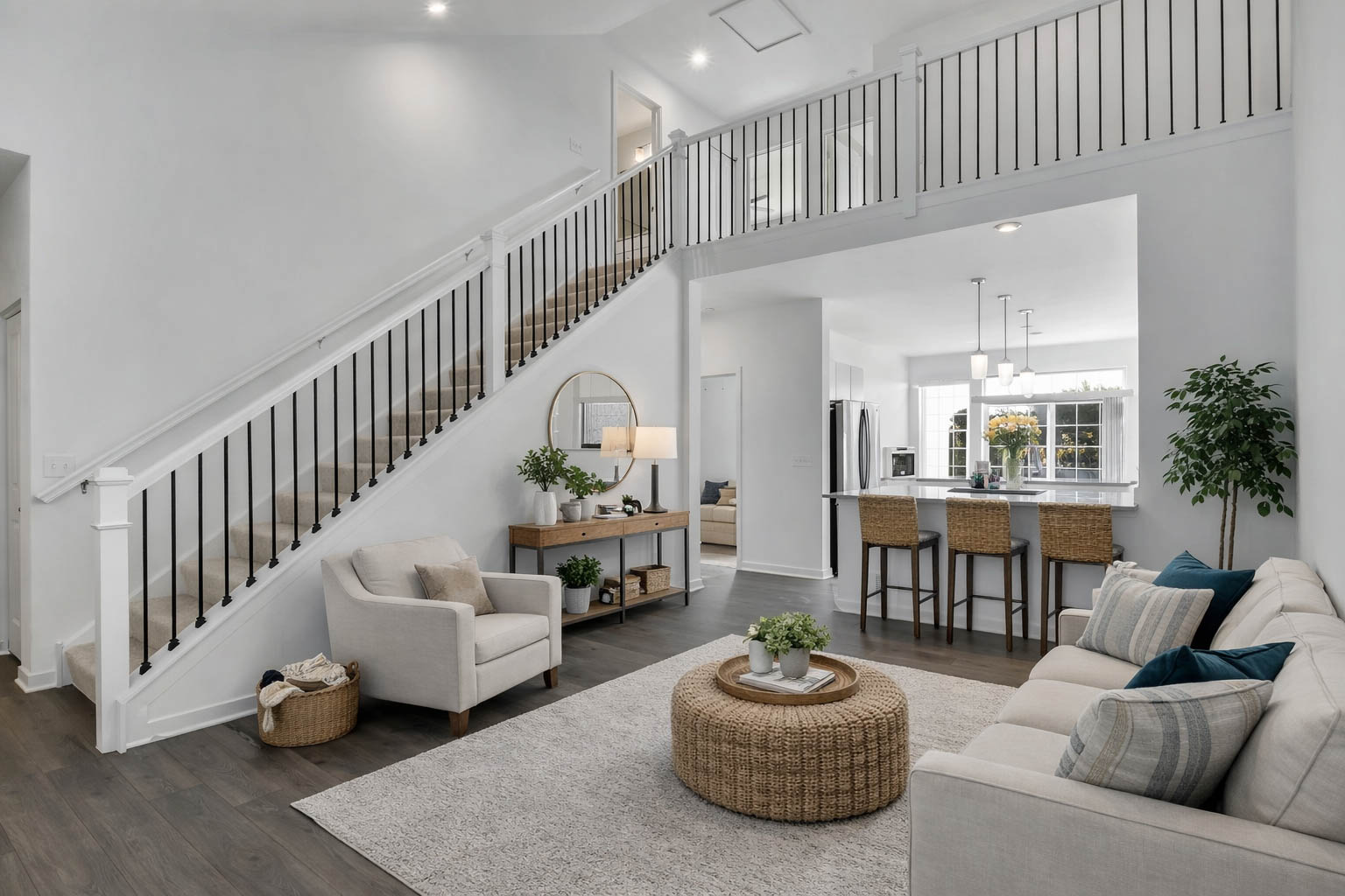 Living room with a staircase and an open kitchen at Home at Ashcroft